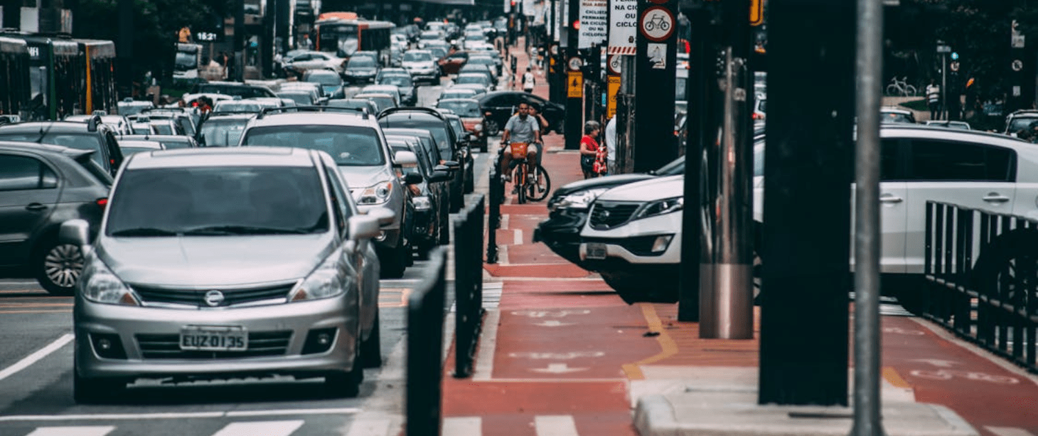 An image of city traffic. An intro to compare emission levels in EVs and ICE vehicles.